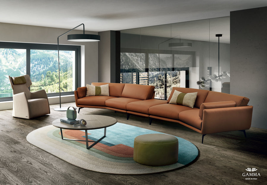Orange leather Ralph 5 seater sofa placed in a modern living room.