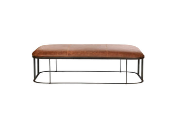 Ace Ottoman with iron base and top grain leather padded cushion. Front view.