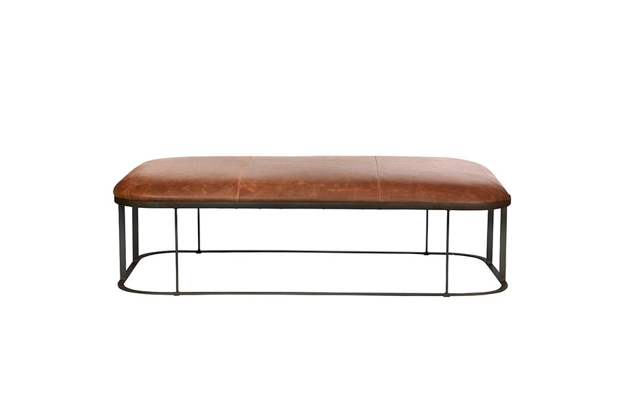 Ace Ottoman with iron base and top grain leather padded cushion. Front view.
