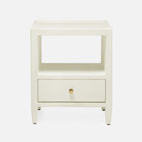 The Jarin's classic nightstand in white color with one drawer and an open-air shelf.