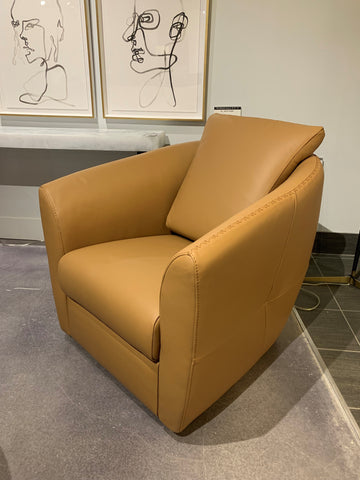 Orange leather bubble swivel chair.