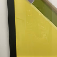 Abstract Wall Art Piece with glass and black frame.