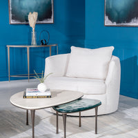 Reuleaux Large Cocktail Table with rounded, asymmetrical top and elegantly tapered legs.