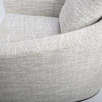 A white mid sized Holly Swivel Chair with Premium down and feather cushioning and wood trim base. Closed up side view.