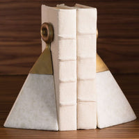 Pyramid shaped Equestrian Marble Bookends with white marble bases topped with a brushed brass stirrup detail.