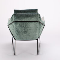 A green and white New York Poltrona lounge Chair with frame in iron rod. Back view.
