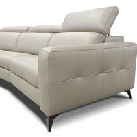 Beige leather 3 seater sofa consisting of left hand maxi recliner, right hand facing maxi recliner each and one armless chair maxi recliner. Side view.