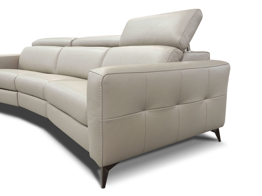 Beige leather 3 seater sofa consisting of left hand maxi recliner, right hand facing maxi recliner each and one armless chair maxi recliner. Side view.
