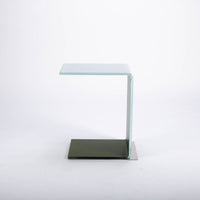 Two-toned bent glass coffee table with glued mat stainless steel plate.