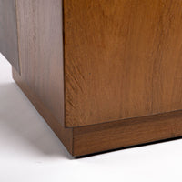 Kobe Low cube side table with wooden look made from ollection of organic designed metal and “Toasted Yukas” wood species from South America. Closed up view of the bottom and sides.