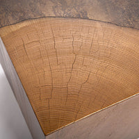 Kobe Low cube side table with wooden look made from ollection of organic designed metal and “Toasted Yukas” wood species from South America. Closed up view of the top.