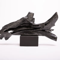 Driftwood Sculpture done in cast iron with a solid black marble base.