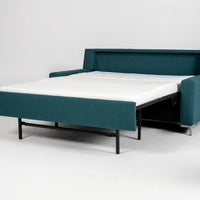 American Leather Bryson Two Seat Comfort Sofa Bed in blue color, front and side view, pulled-out.