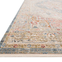 Claire Blue + Multi Area Rug power-loomed of polyester pile with a beautiful color palette and a mix of abstract and traditional-inspired motifs.