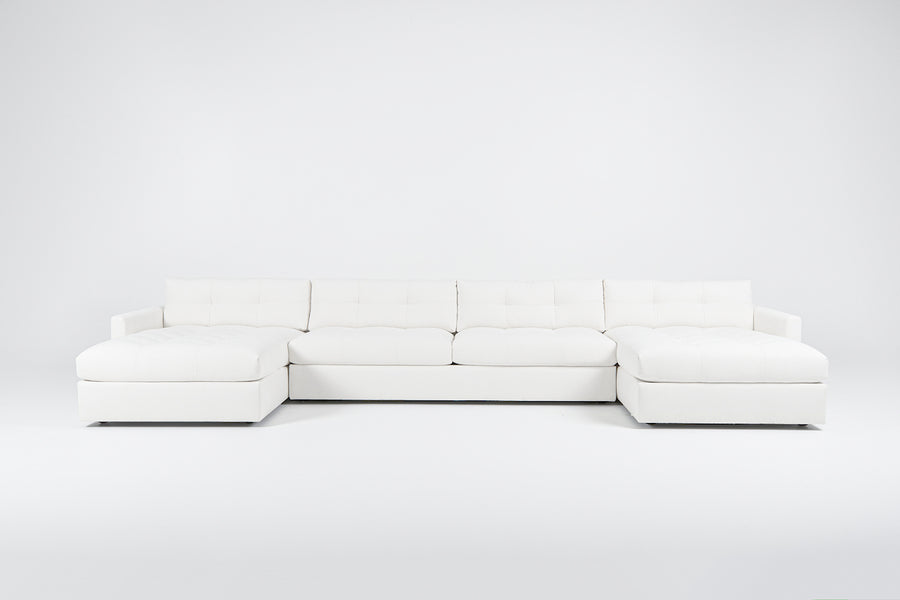 Large white u-shaped Carmet Sectional with sleek track arms. Front view.