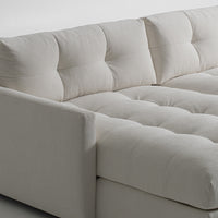 Large white u-shaped Carmet Sectional with sleek track arms. Closed up side view.