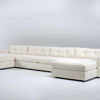 Large white u-shaped Carmet Sectional with sleek track arms.