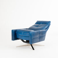 A reclined blue leather recliner chair with four star base, side and front  view.