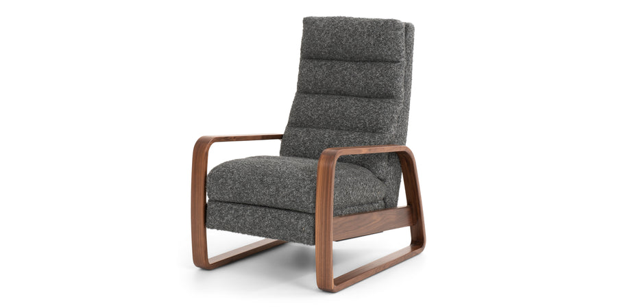 The Elton XT recliner by American Leather with wooden arms formed into soft geometric shapes, down-filled channel-tufted back and seat cushions. Grey color, front and side view.