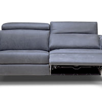 Grey Ermes leather sofa with power mechanism and touchpad that individually controls headrest and footrest. Front view with one side reclined.