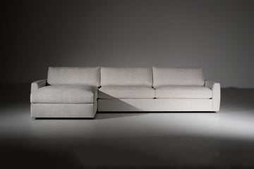 Ash colored Estero sectional by American leather. Front view.