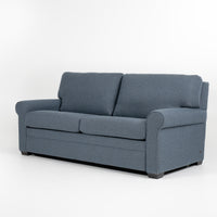 American Leather Gibbs Two Seat Standard (Queen) Comfort Sofa bed in indigo color with high tapered wood legs, front and side view