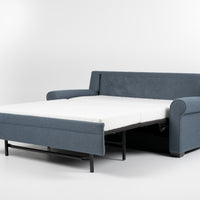 American Leather Gibbs Two Seat Standard (Queen) Comfort Sofa bed in indigo color with high tapered wood legs, front and side view, pulled-out.
