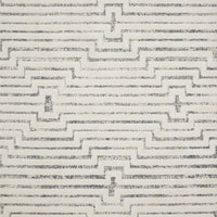 Hagen White Sky Area Rug power-loomed of 100% polypropylene pile with a tone on tone palette offset by strong, yet textural geometric patterns.