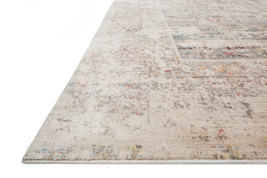 Javari Ivory + Granite Area Rug with power-loomed polyester and polypropylene construction and with distressed all-over patterns.