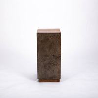 Kobe Low cuboid side table with wooden look made from ollection of organic designed metal and “Toasted Yukas” wood species from South America.