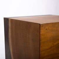Kobe Low cuboid side table with wooden look made from ollection of organic designed metal and “Toasted Yukas” wood species from South America. Closed up top and side view.