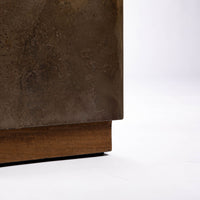 Kobe Low cuboid side table with wooden look made from ollection of organic designed metal and “Toasted Yukas” wood species from South America. Closed up bottom view.