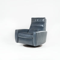 A blue Lanier leather recliner chair with the shape of classic automotive designs.