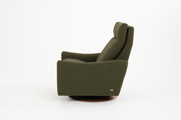 A green fabric Ontario modern rocking recliner chair, side view.