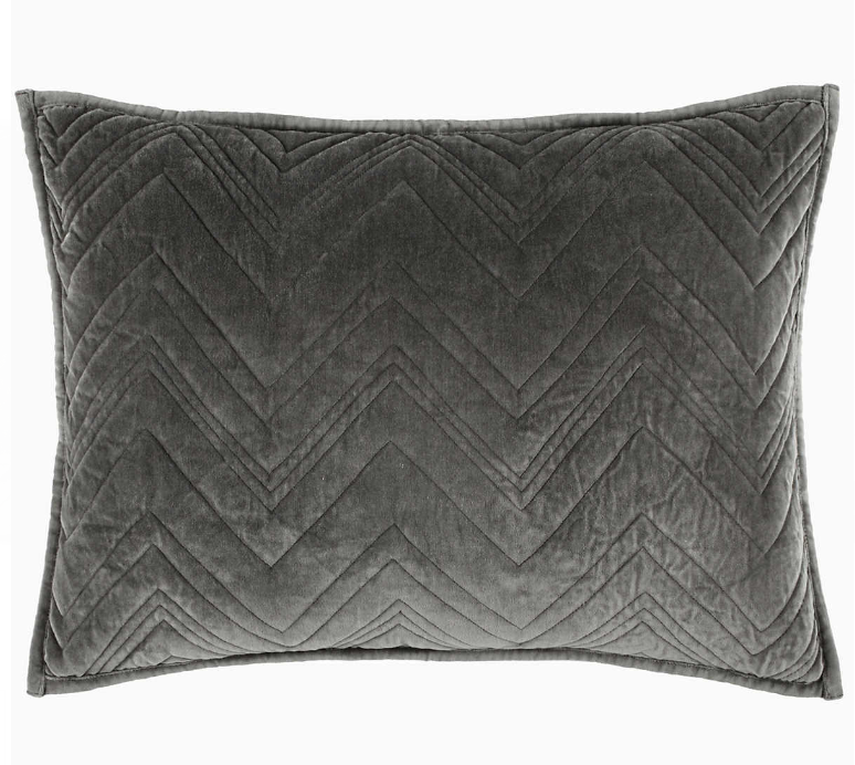 A gray pillow from Brentwood Velvet Collection bedding.