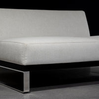 Ash two seat Sodeo Sofa with sophisticated architectural design and slab and classic and contemporary metal platform. Partial left side view.