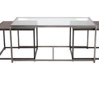 Metal nesting cocktail table consisting of glass top center table and 2 outer bunching tables, slide under the ends of the center table