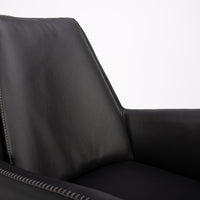 A black leather Kate swivel armchair. Closed up front view.