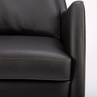 A black leather Kate swivel armchair. Closed up front view.
