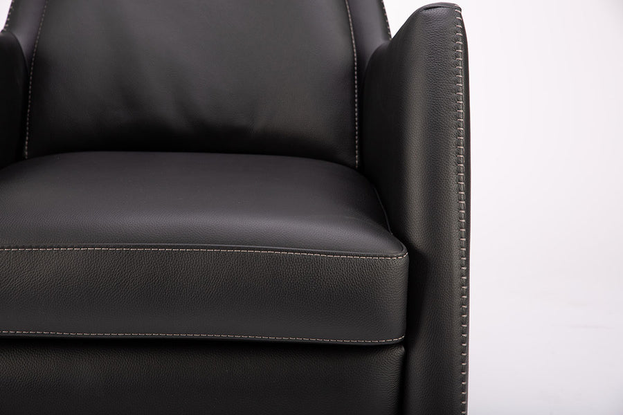 A black leather Kate swivel armchair. Closed up front view.