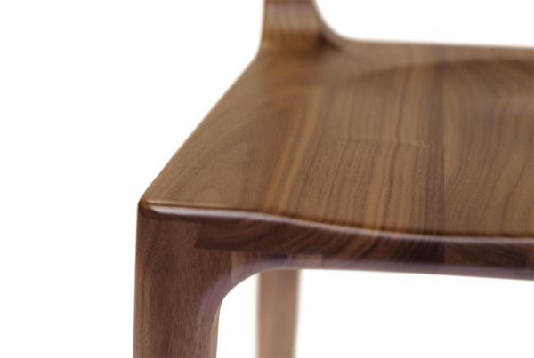 Lisse dining chair crafted in solid American black walnut hardwood and Made to Order in natural finish. Closed up seat view.