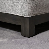 Closed up view of a leg of Oscar sofa.