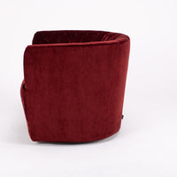 Amelie Swivel Chair in dark red, side view.