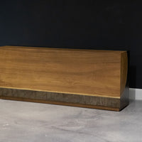 Yuka wood Kobe console with the anodized metal panels and toasted finish.