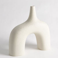 White Stretch Vase Reminiscent of the 1960's lava glaze ceramics.