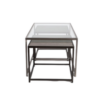 Metal nesting cocktail table consisting of glass top center table and 2 outer bunching tables, slide under the ends of the center table