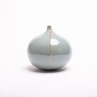 Milo Vase with vertical overlapping edge.