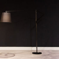 Cloe contemporary Floor Lamp in aged brass, with frame and base in lacquered metal and adjustable arm in lacquered aluminum.