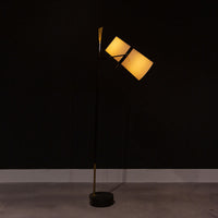 Yasmin Antique Iron modern Floor Lamp with a black iron tapered slender vertical rod and a blade shaped vintage brass finish finial.