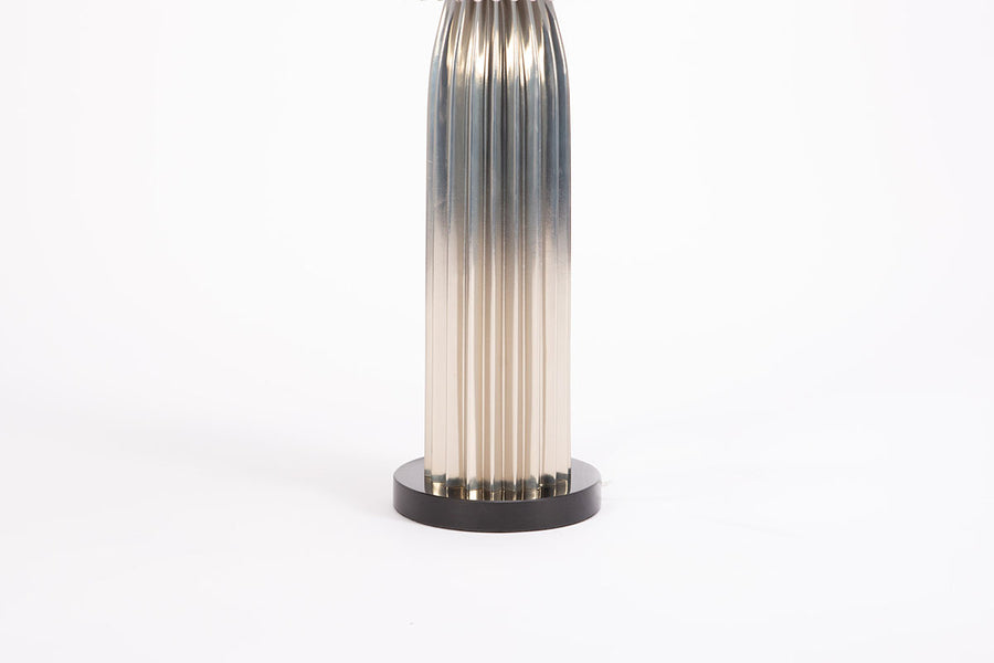 Bronze Crimp Table Lamp with hand crimped steel base and shade with a granite base in a geometric form. Closed up view on the body and base.